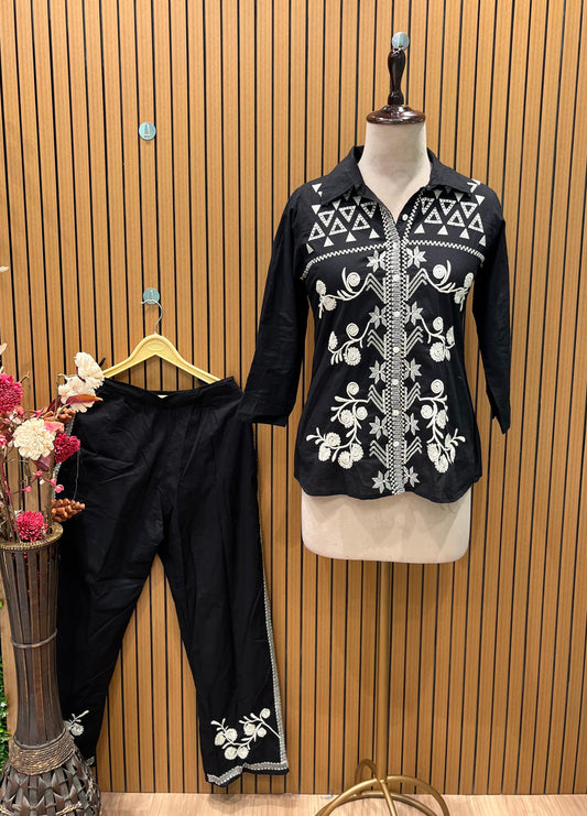 Stylish black cotton suit featuring elegant white thread embroidery