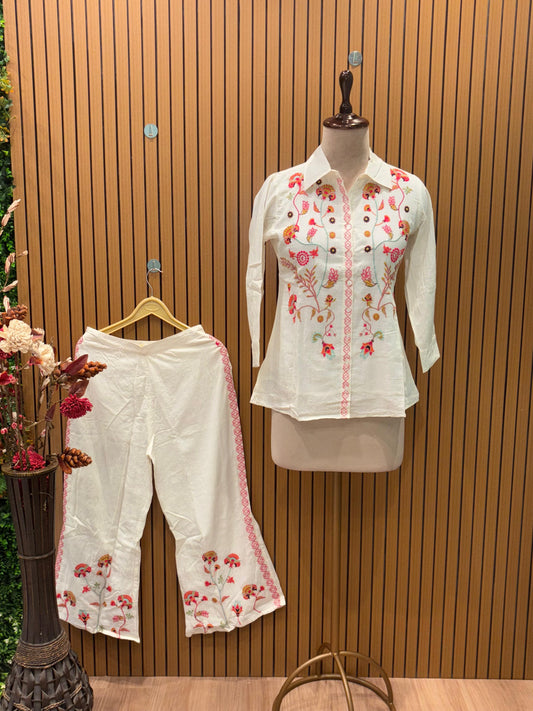 Trendy ethnic co-ord set features a cream-colored cotton fabric