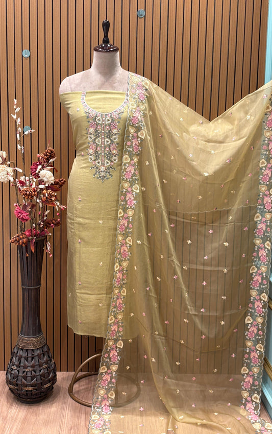 Elevate your ethnic wardrobe with this exquisite unstitched suit