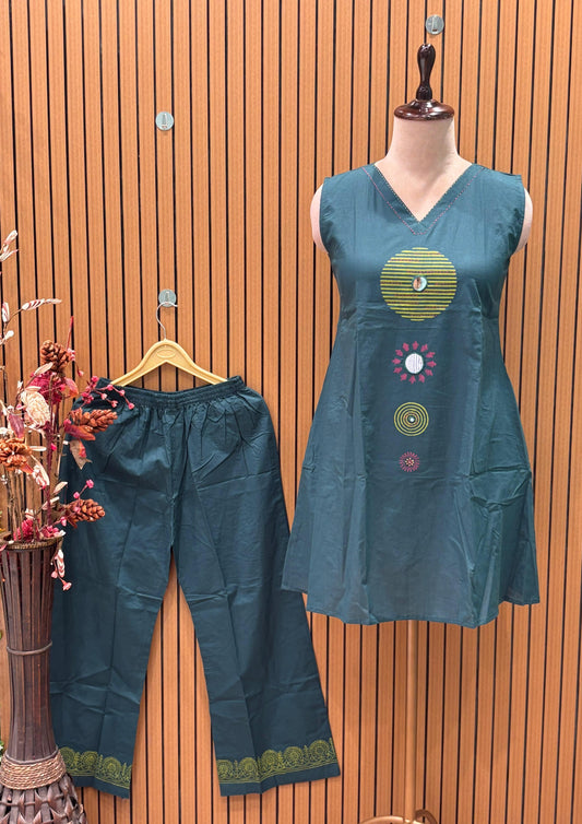 Trendy and elegant kurti pent featuring intricate thread embroidery