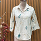 Elegant co-ord set in off-white cotton-linen blend featuring leaf