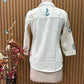 Elegant co-ord set in off-white cotton-linen blend featuring leaf