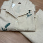 Elegant co-ord set in off-white cotton-linen blend featuring leaf
