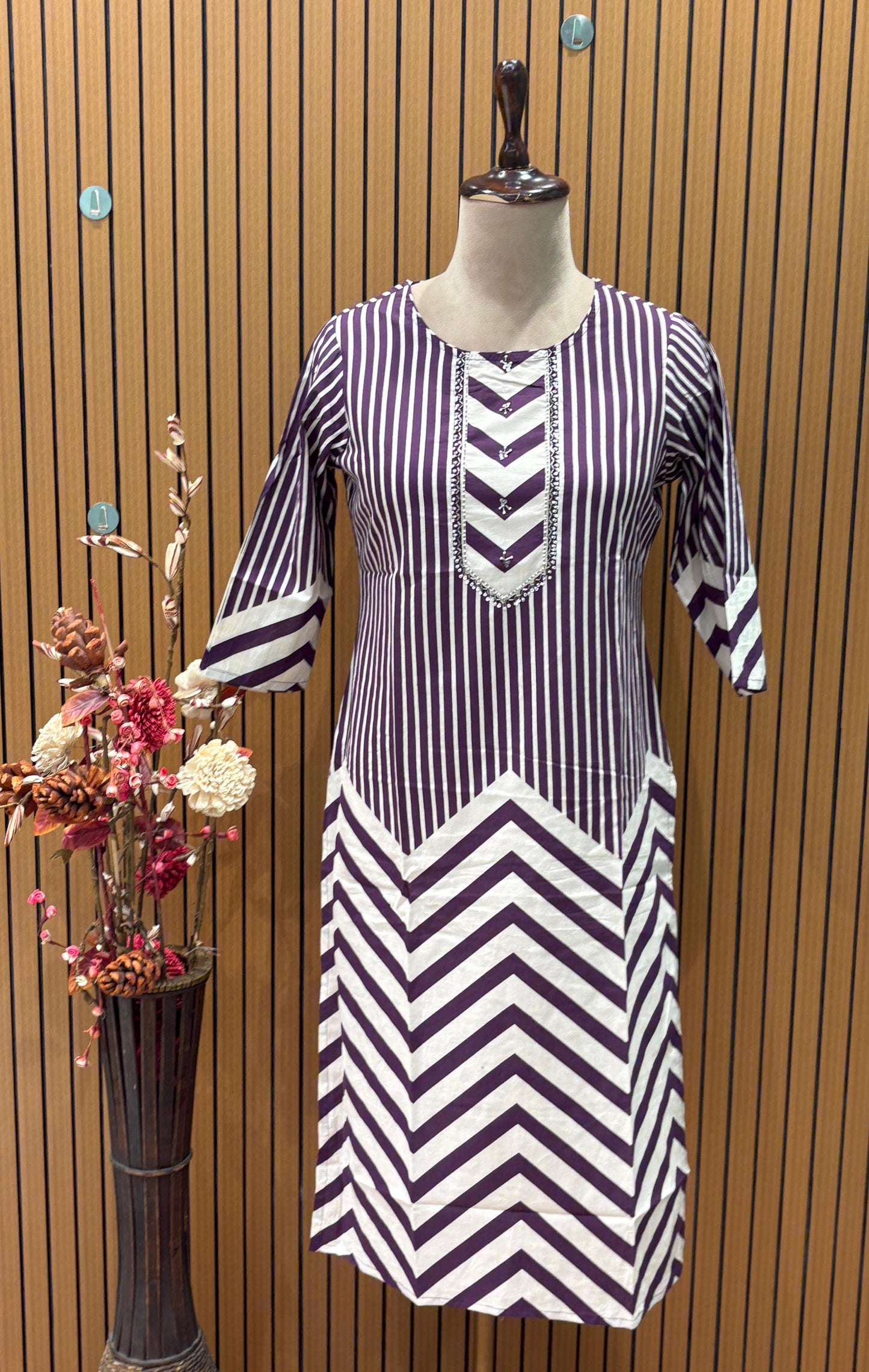 Elevate your ethnic style with this elegant purple cotton suit
