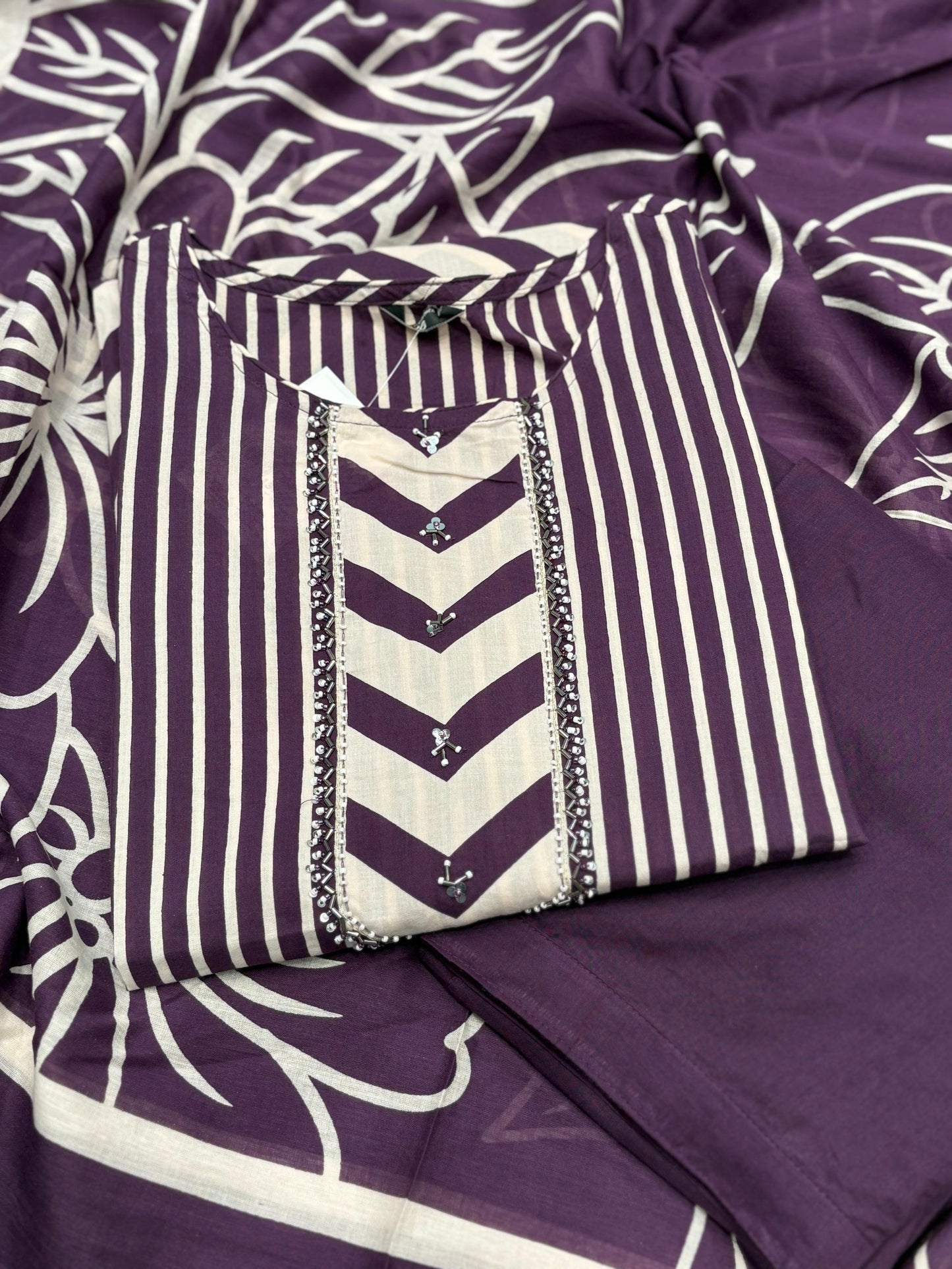 Elevate your ethnic style with this elegant purple cotton suit
