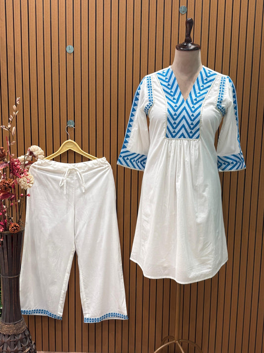 Stylish cotton kurti with palazzo featuring elegant gota patti neckline