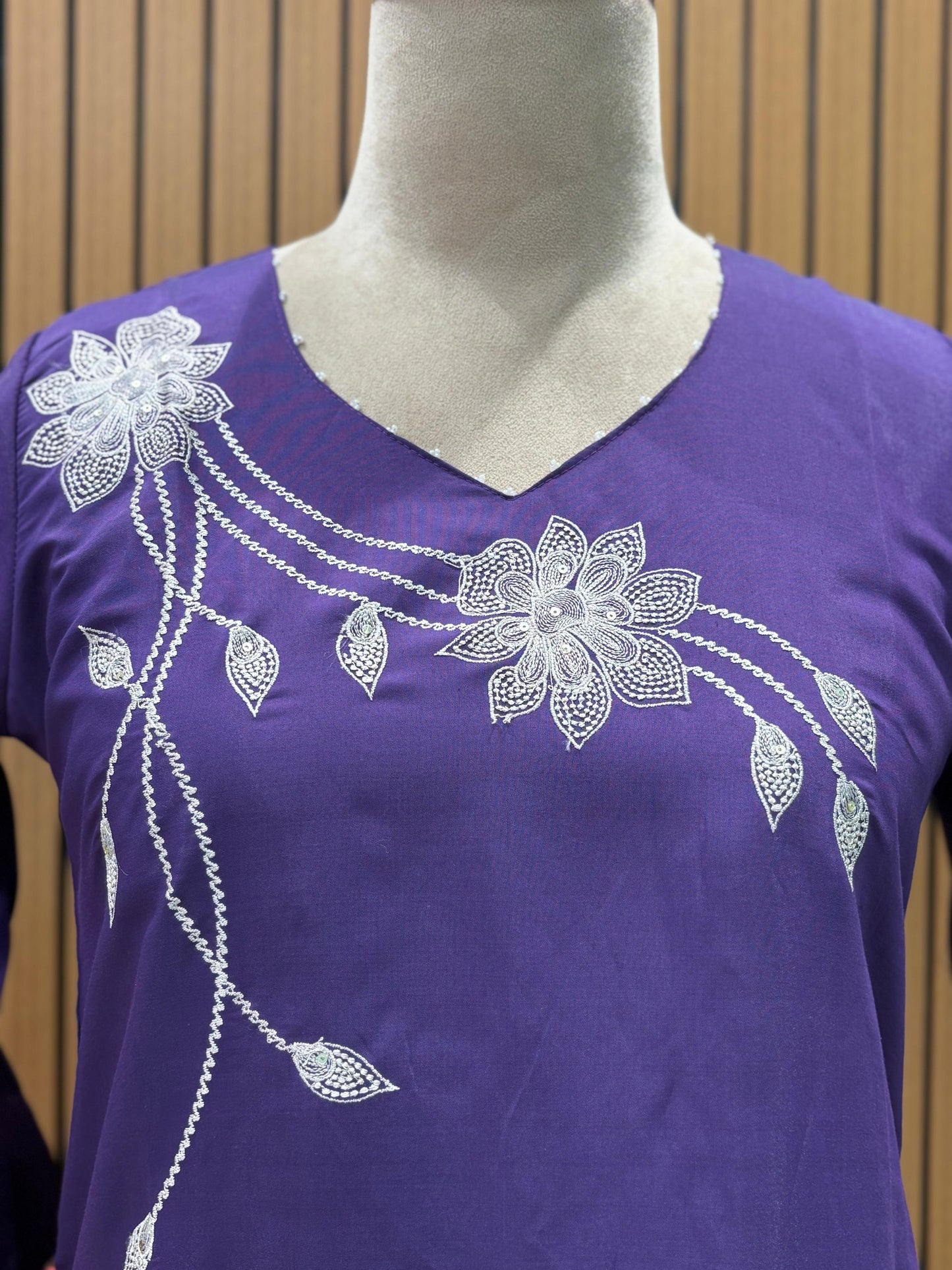 Add charm to your look with this stylish modal cotton kurti set