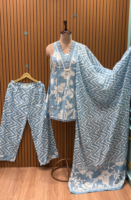 Breeze through summer in this sky blue cotton printed suit