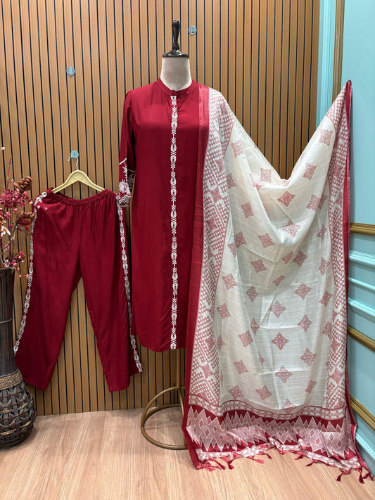 Step into effortless elegance with this beautifully crafted maroon cotton suit set