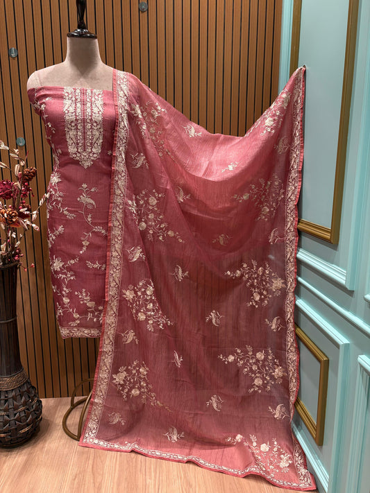 Elevate your ethnic wardrobe with this timeless unstitched suit set