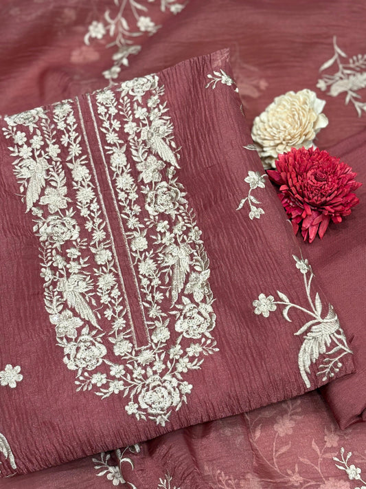 Elevate your ethnic wardrobe with this timeless unstitched suit set