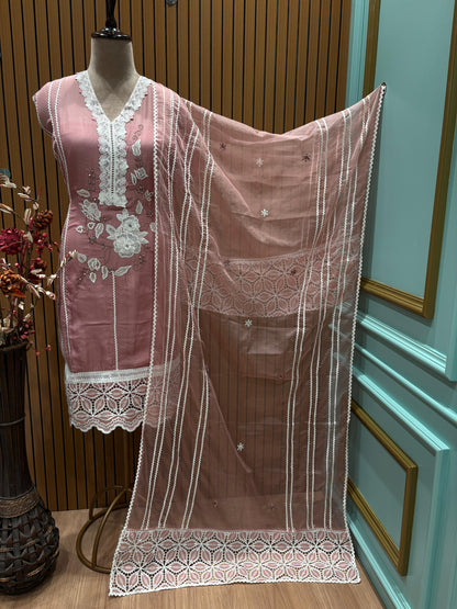 Presenting an elegant unstitched suit set, perfect for graceful day and evening wear