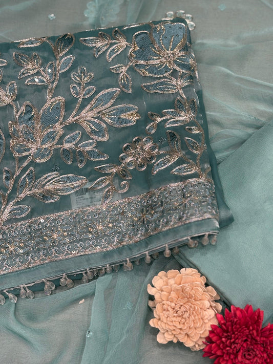Indulge in timeless elegance with this exquisite unstitched suit set