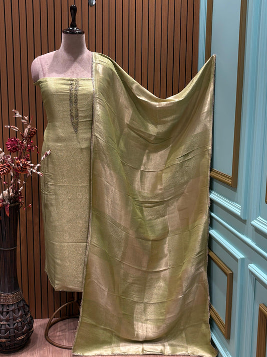 Step into timeless elegance with this luxurious unstitched suit