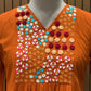 Brighten your wardrobe with this vibrant orange A-line kurti set