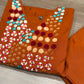 Brighten your wardrobe with this vibrant orange A-line kurti set