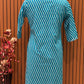 Make a statement in this vibrant turquoise kurti set