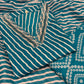 Make a statement in this vibrant turquoise kurti set