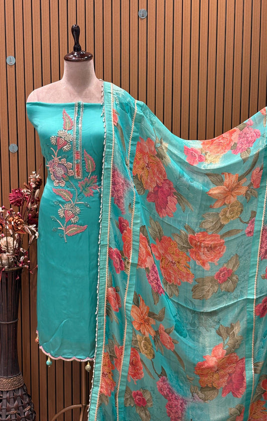 Unveil a graceful festive look with this unstitched suit set