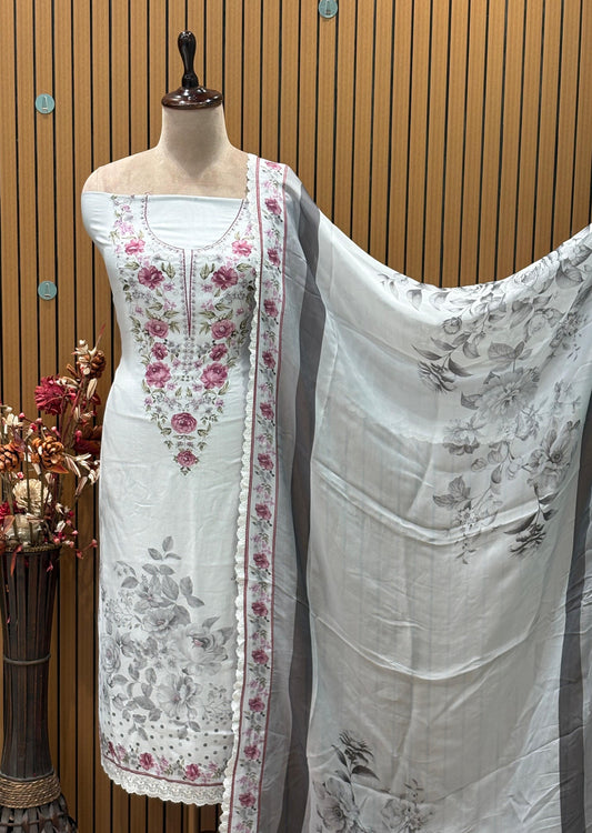 Add charm to your collection with this elegant unstitched suit set.