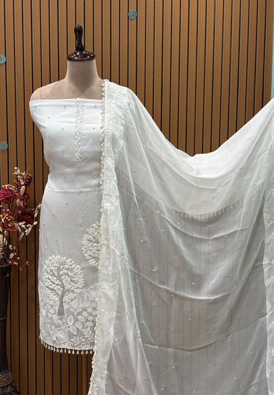 Step into elegance with this unstitched suit se