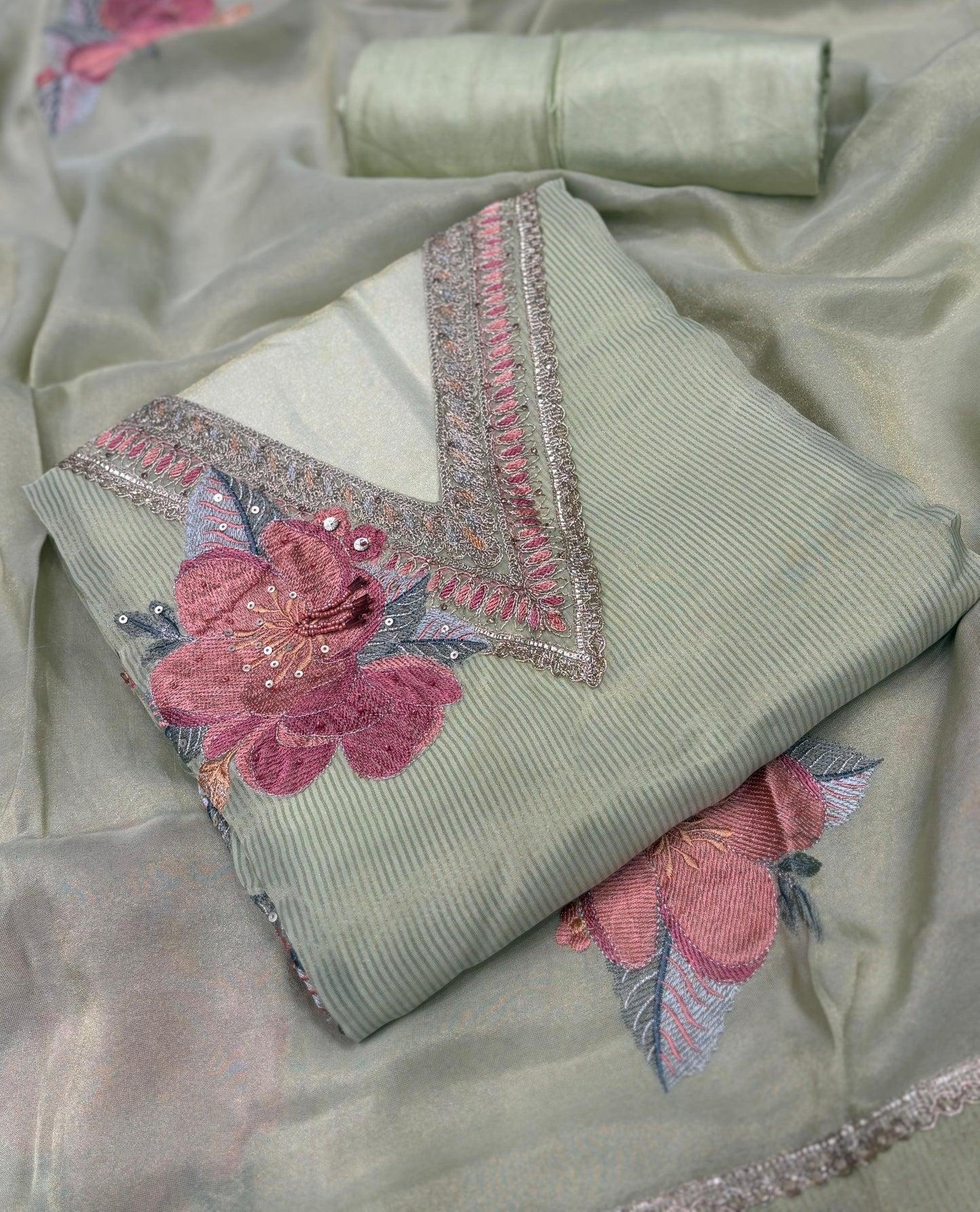 Grace meets glamour in our exquisite unstitched suit set