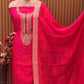 Add a regal charm to your festive wardrobe with this unstitched suit