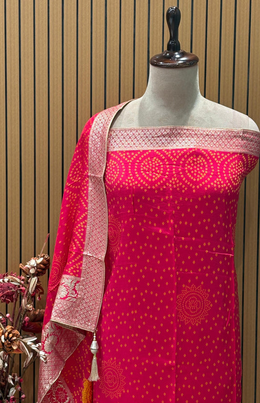 Add a regal charm to your festive wardrobe with this unstitched suit