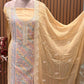Presenting an elegant unstitched suit set in a soothing mustard-gold hue