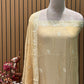 Presenting an elegant unstitched suit set in a soothing mustard-gold hue