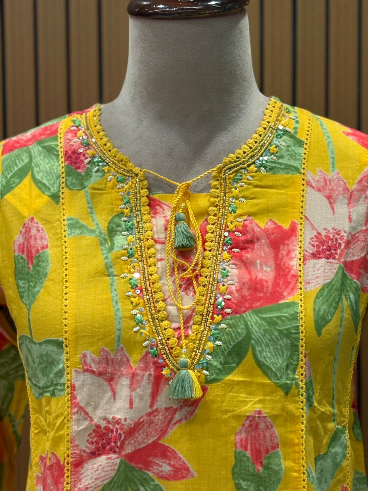 Brighten your festive wardrobe with this vibrant yellow A-line suit