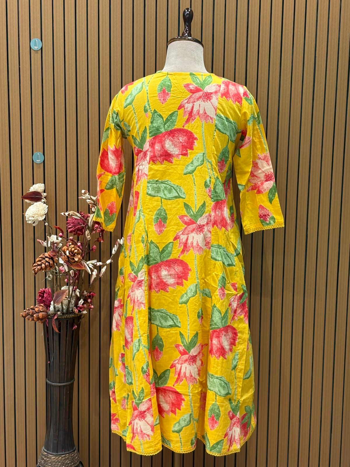 Brighten your festive wardrobe with this vibrant yellow A-line suit