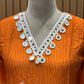 Orange cotton suit with shell mirror work neckline