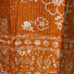 Orange cotton suit with shell mirror work neckline