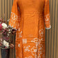 Orange cotton suit with shell mirror work neckline