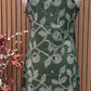 Sleeveless green flared dress with white swirl-leaf
