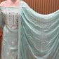 Elevate your festive wardrobe with this exquisite ensemble crafted
