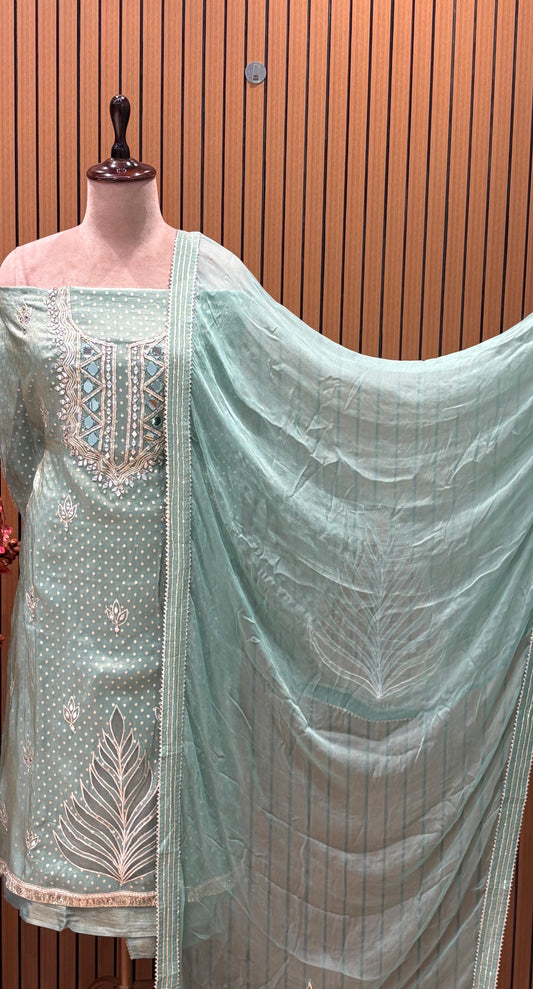 Elevate your festive wardrobe with this exquisite ensemble crafted