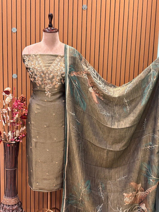 Unveil the charm of elegance with this olive green unstitched suit set