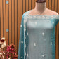 Elevate your festive wardrobe with this exquisite unstitched suit set