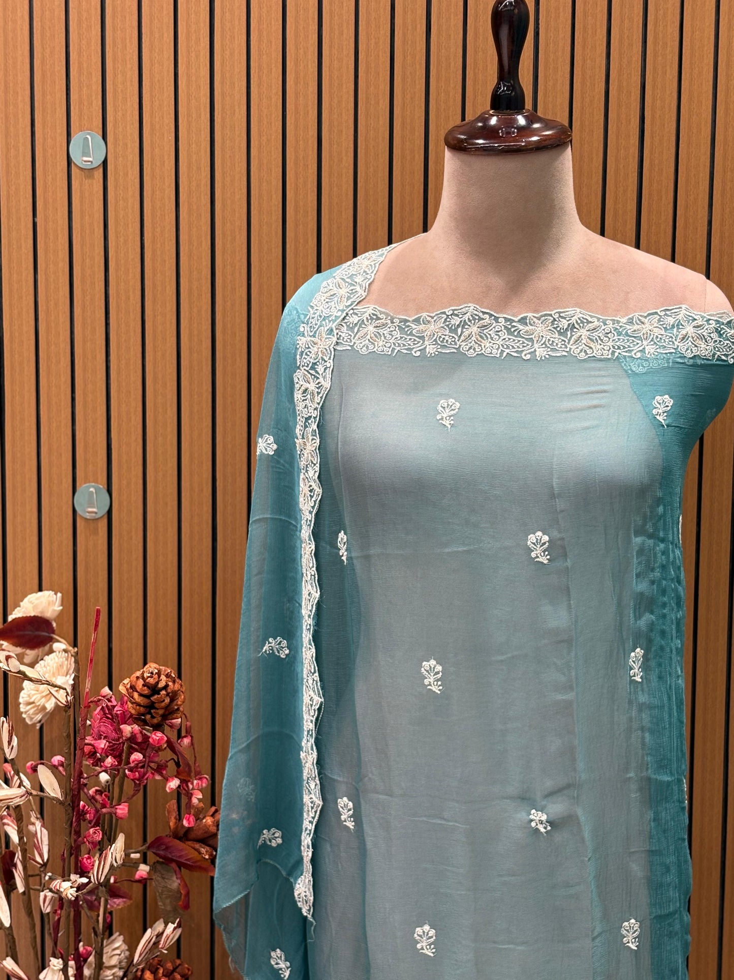 Elevate your festive wardrobe with this exquisite unstitched suit set