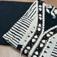 Step into elegance with this black & white printed cord-set