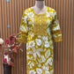 Embrace festive charm with this mustard floral print suit