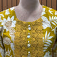 Embrace festive charm with this mustard floral print suit
