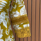Embrace festive charm with this mustard floral print suit