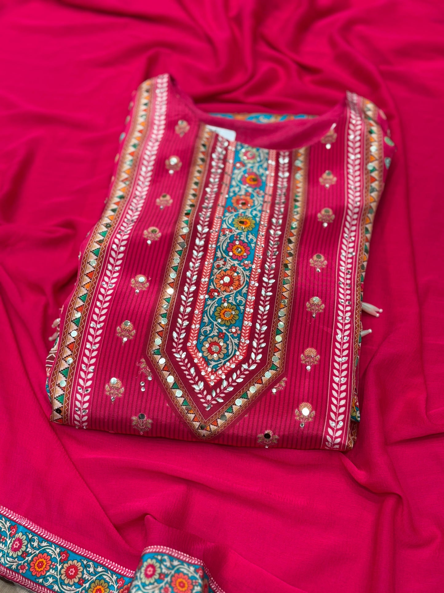 Brighten your wardrobe with this vibrant pink printed kurti