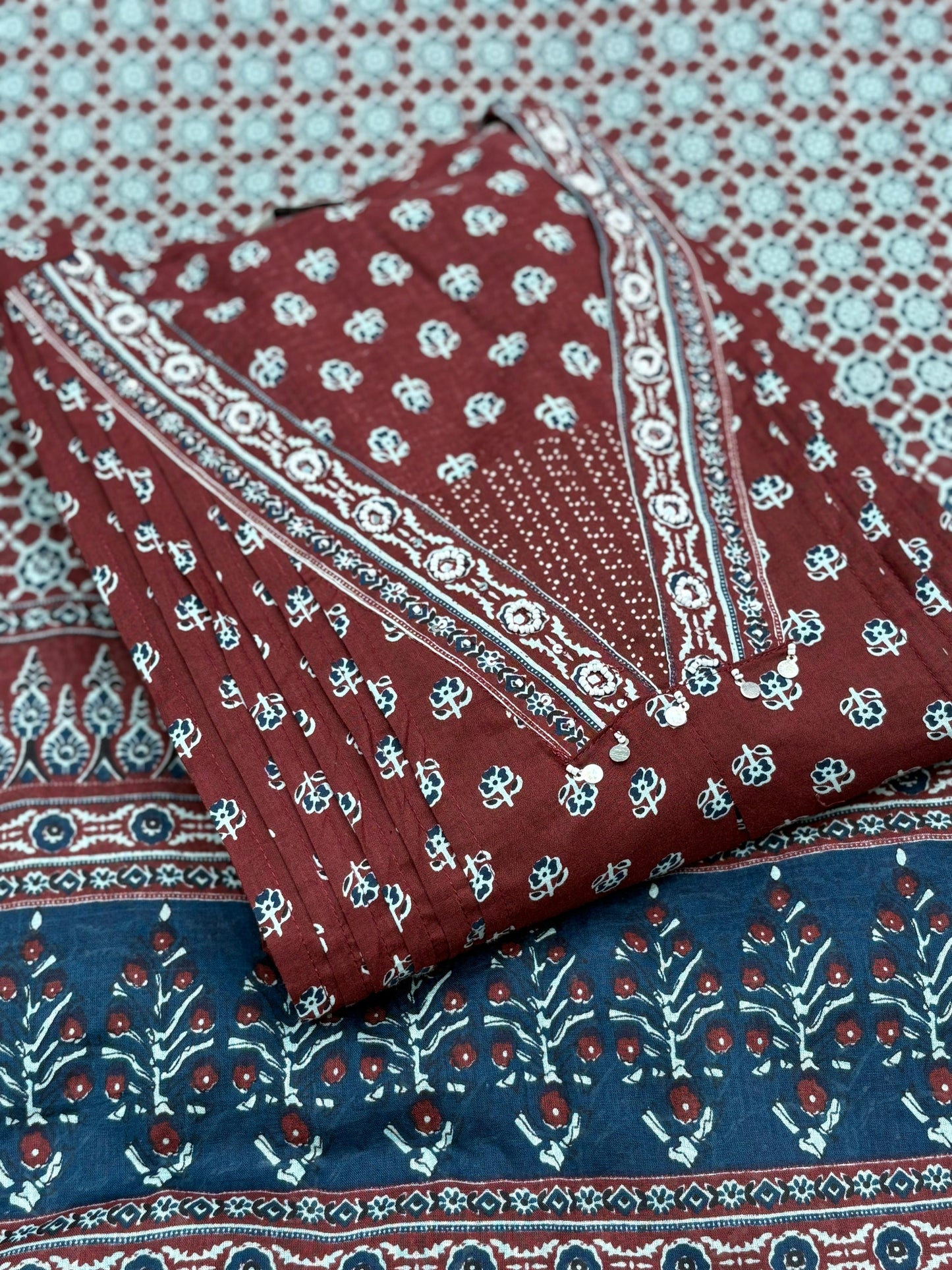 Elevate your everyday style with this maroon A-line cotton kurti set