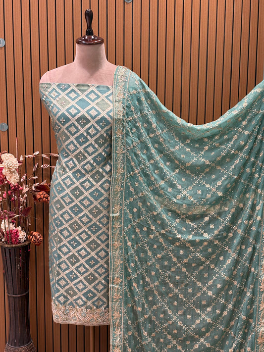 Celebrate this festive season in royalty with our exquisite unstitched suit set.