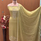 Unveil festive elegance with this stunning unstitched suit
