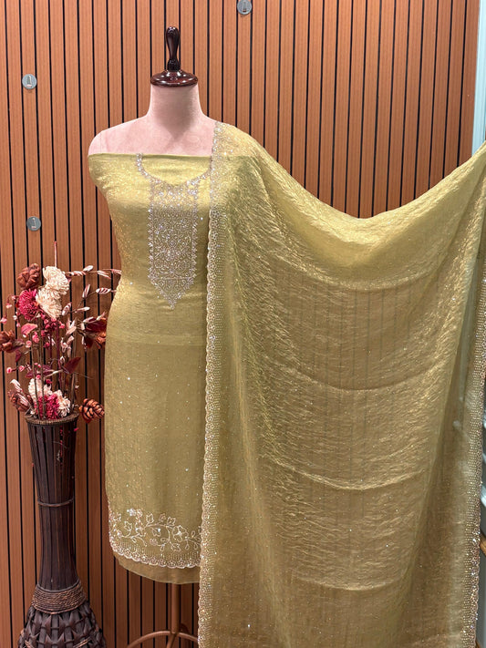 Unveil festive elegance with this stunning unstitched suit
